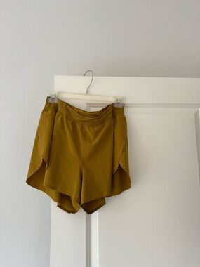 lululemon Find Your Pace Shorts in Mustard